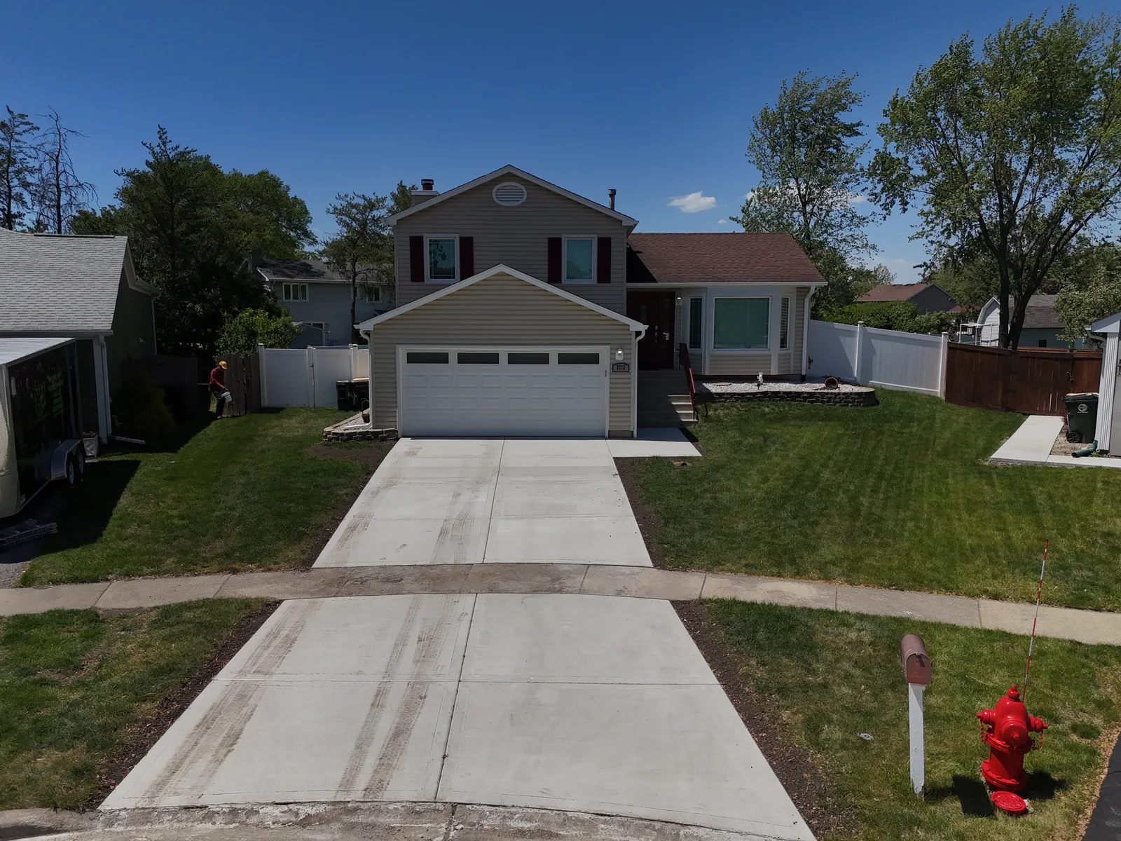 Full concrete driveway replacement — aerial drone view