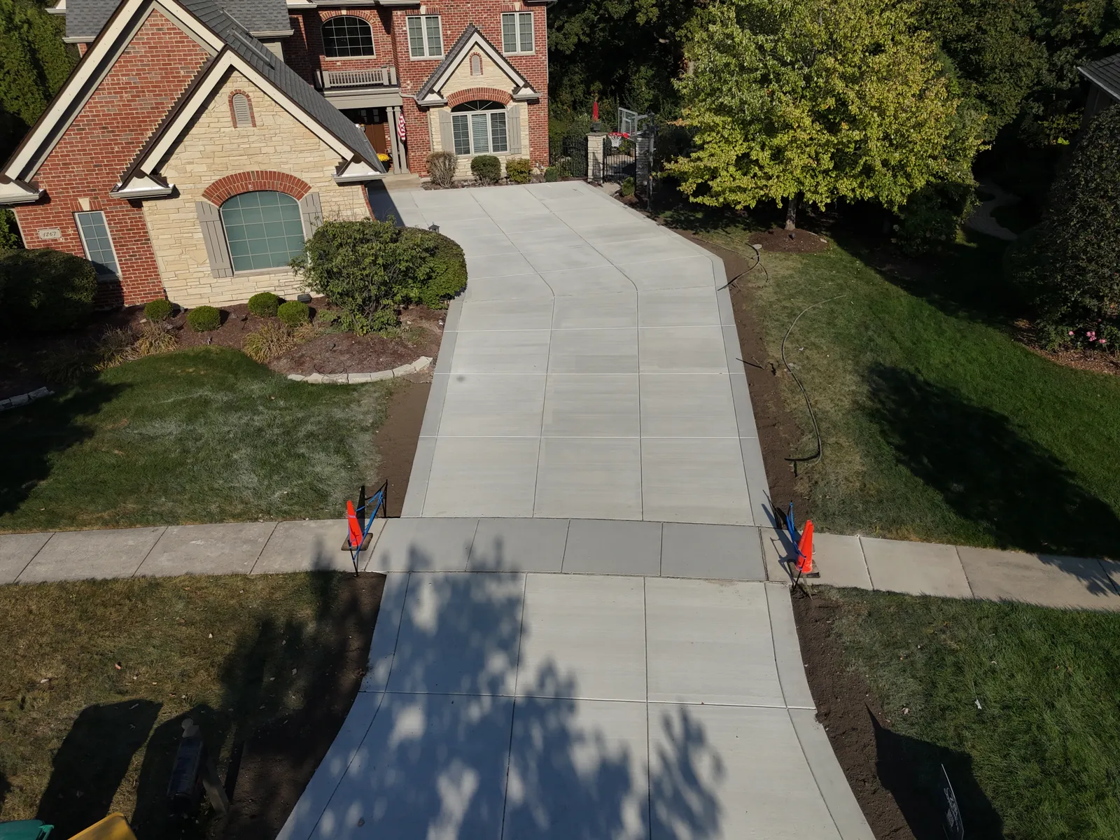Large concrete driveway bird's-eye aerial view