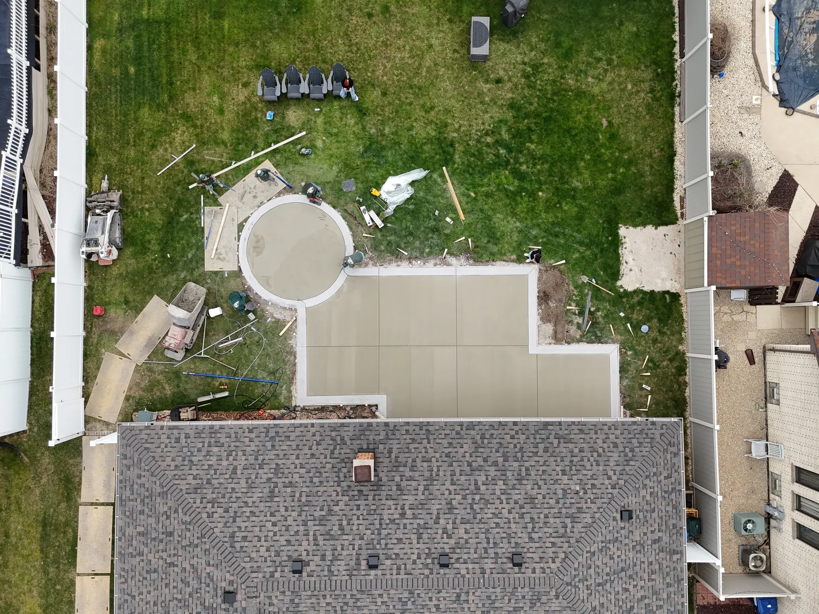 New construction concrete patio overview — aerial drone