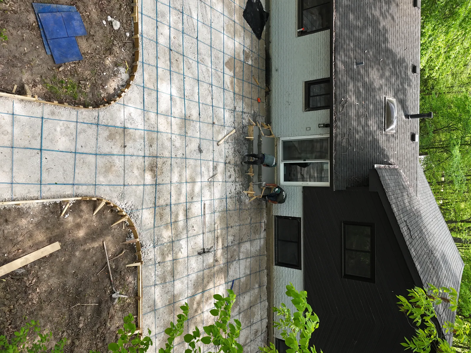 Concrete patio rebar preparation and construction — drone view