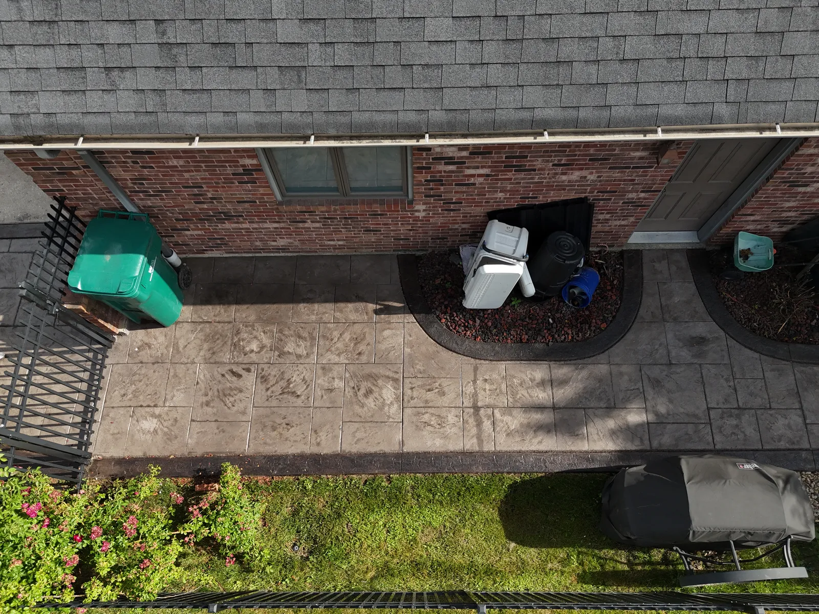 Stamped patio with curved planter bed cutout detail