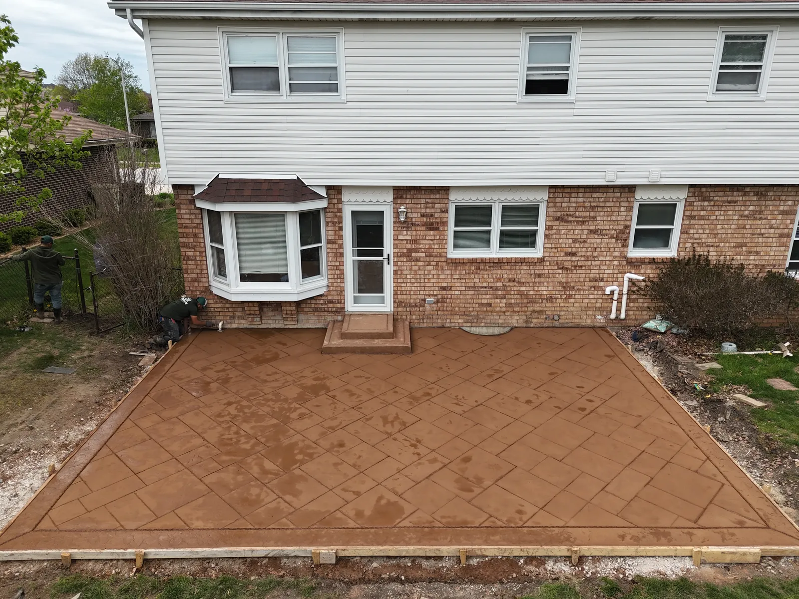 Terra cotta stamped patio front view showing full layout