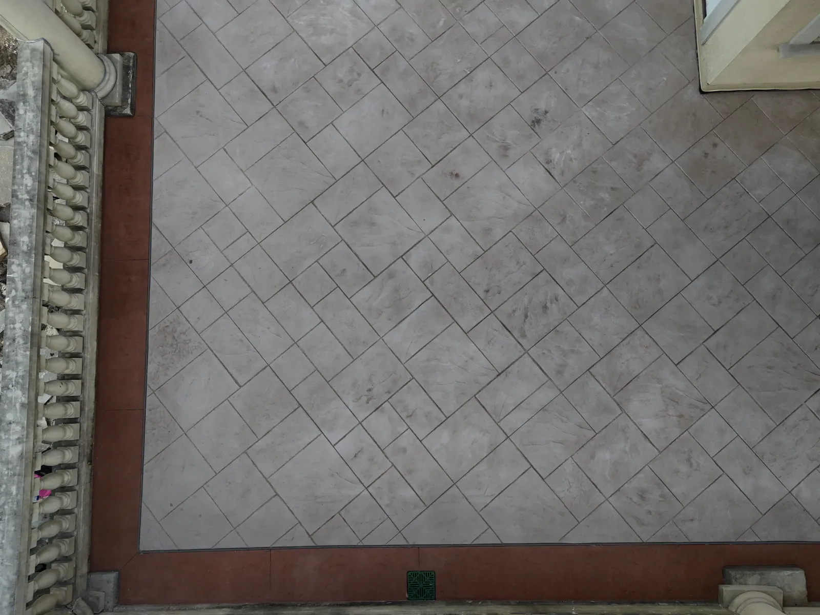 Stamped veranda herringbone pattern with terracotta border detail