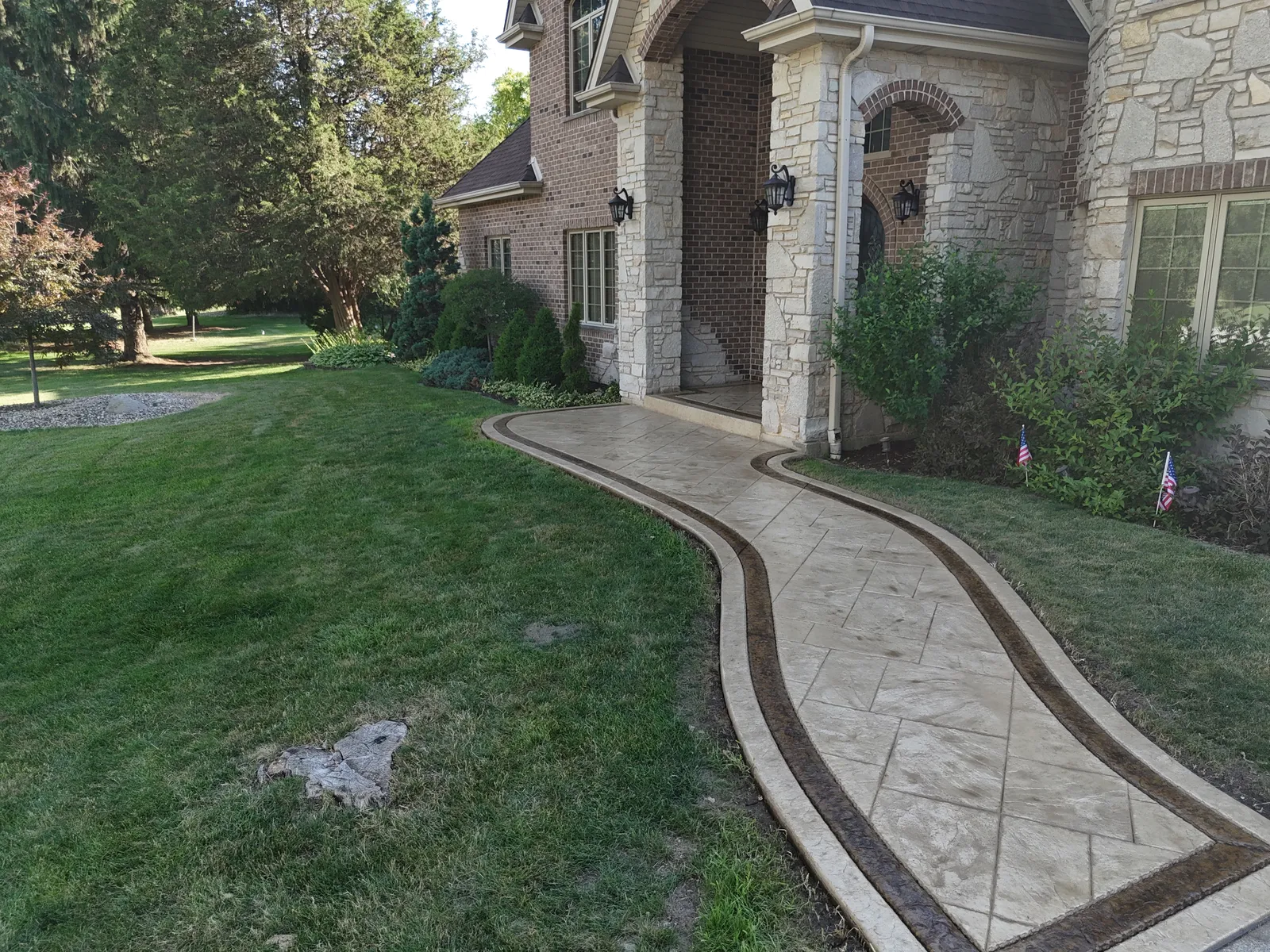 Stamped S-curve walkway side view showing full length